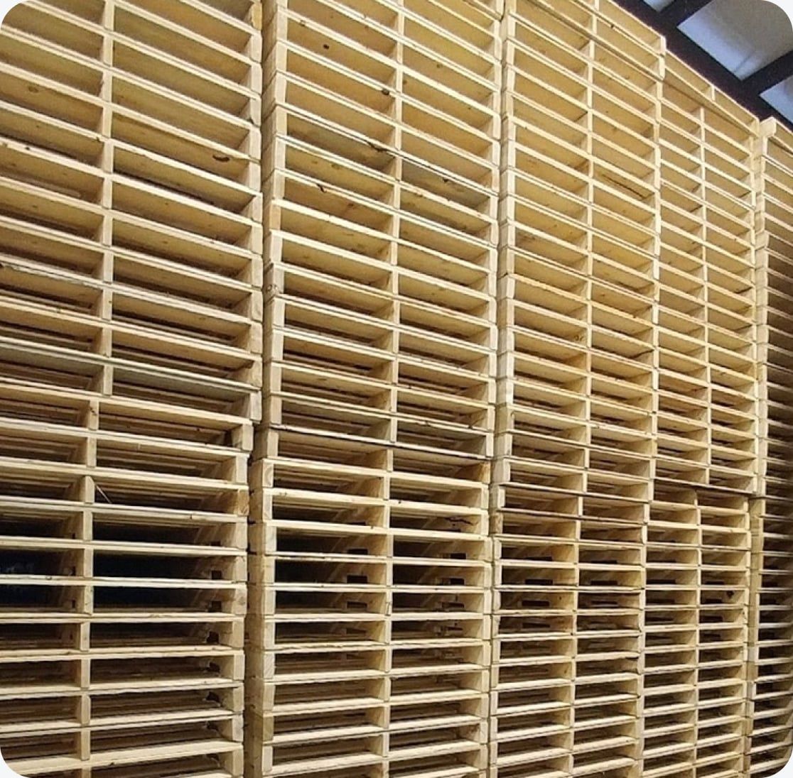 wooden pallets stacked up