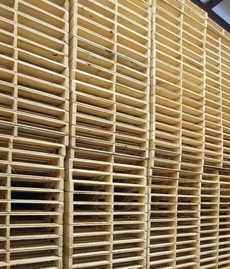 wooden pallets stacked up