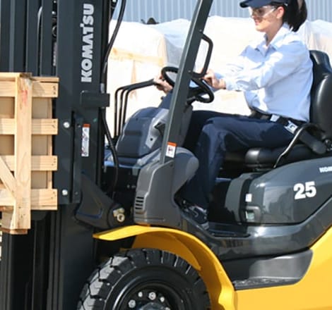 woman driving forklift