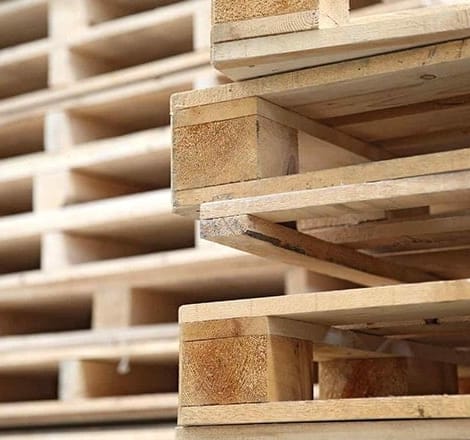 close-up of stacked recycled pallets