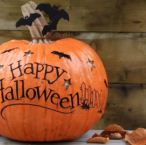 pumpkin that says "Happy Halloween"