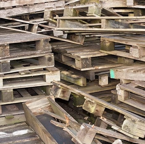 old broken pallets in a pile