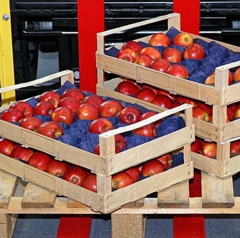 pallets holding apples and produce
