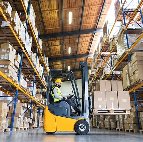 warehouse forklift lifting pallets