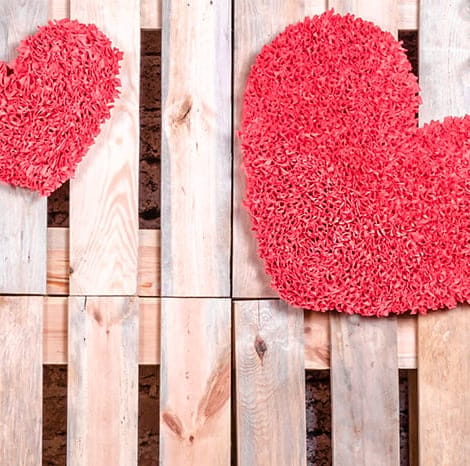 hearts hanging on old pallets