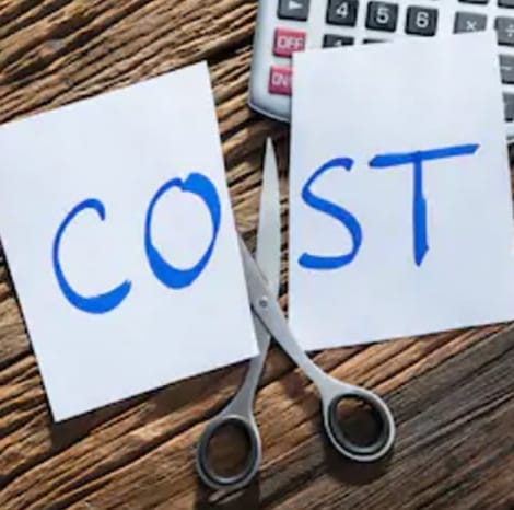 Cost written on paper cut in half