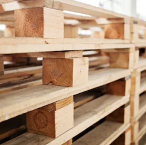 wooden pallets stacked up