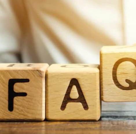 FAQ spelled out in wooden blocks