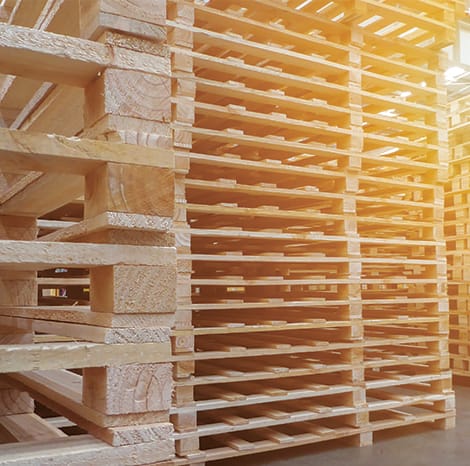 wooden pallets stacked up