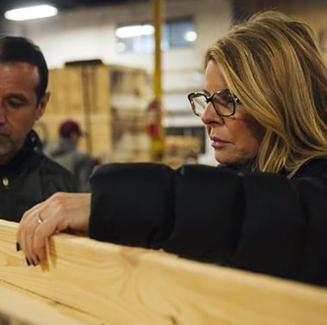 Two people going over pallet assessment