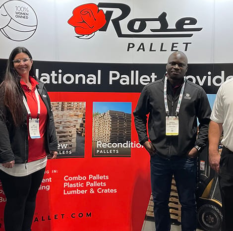 Rose Pallet Employees smiling for portrait at expo