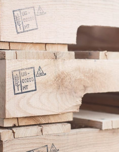 close-up of multiple pallets stacked up