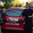 amy olson and mia allen in front of rose pallet car