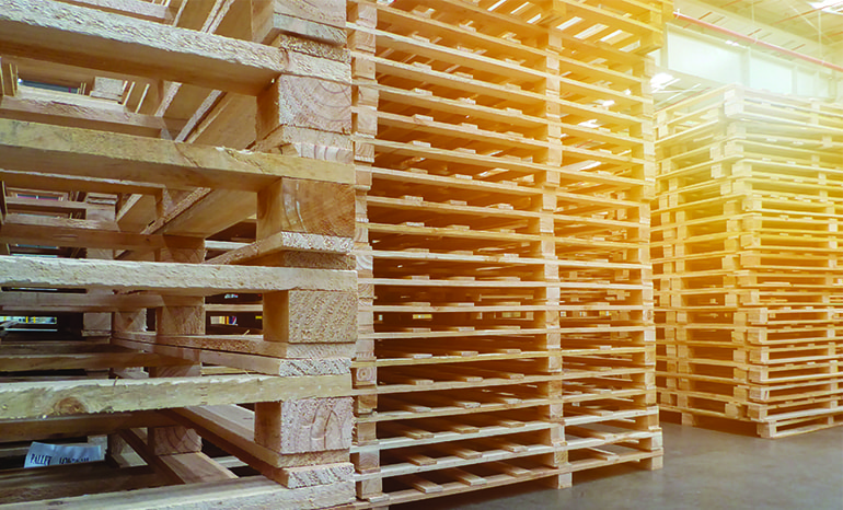 wooden pallets stacked up
