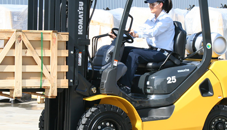 woman driving forklift