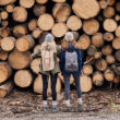 two females staring at wood
