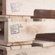 close-up of multiple pallets stacked up